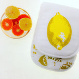 Double oven glove with lemons screen print in panama cotton drill : adds a zesty flavour. Designed by Curious Lions and made in the UK.