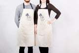 Apron with ship screen print, designed by Curious Lions and made in the UK. This unisex natural cotton item makes a nautical gift.